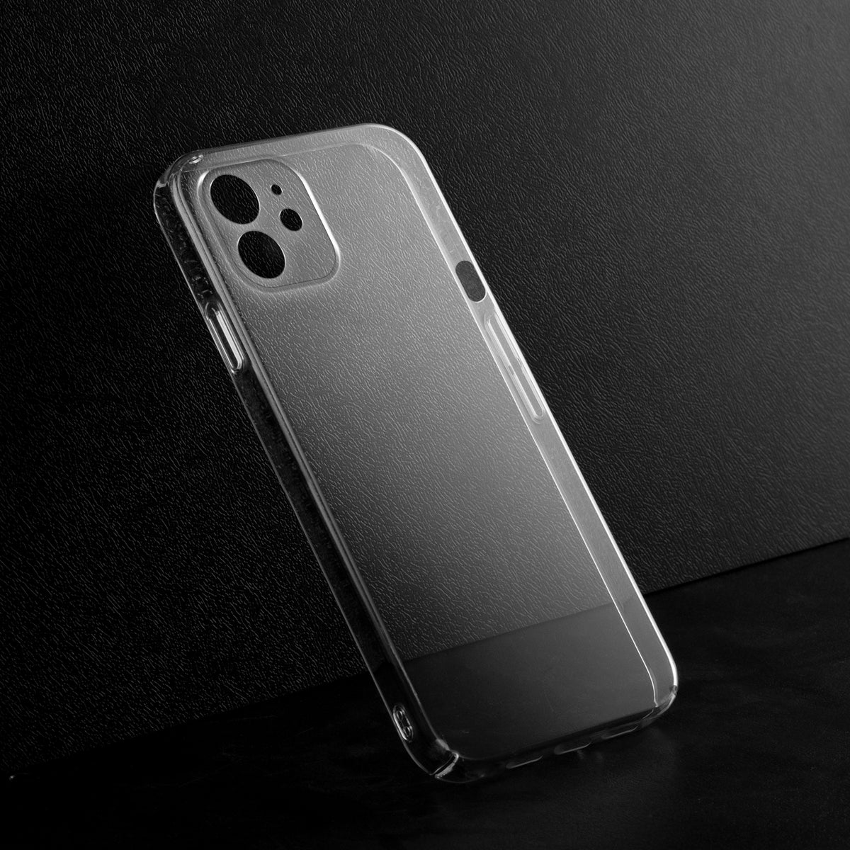 Crystal clear anti-yellow hard back case for Apple iPhone 12 Mini placed on surface showing slim profile and precise camera cutouts