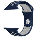 Silicone Apple Watch strap in Orange and Grey, size 42mm, showing secure Strap closure and breathable dotted inner lining