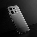Crystal clear anti-yellow hard back case for Redmi Note 13 Pro 5G placed on surface showing slim profile and precise camera cutouts