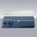 Transparent hard back case being installed on Motorola Moto Edge 60 Stylus 5G showing perfect alignment and camera protection fit