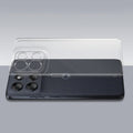 Transparent hard back case being installed on Motorola Moto G56 5G showing perfect alignment and camera protection fit