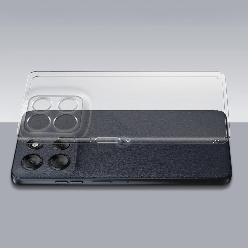 Transparent hard back case being installed on Motorola Moto G56 5G showing perfect alignment and camera protection fit