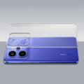 Transparent hard back case being installed on Realme P4 Power 5G showing perfect alignment and camera protection fit