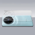 Transparent hard back case being installed on Vivo X100 5G showing perfect alignment and camera protection fit
