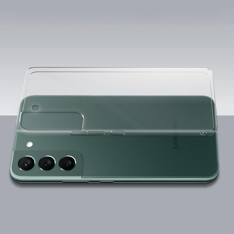 Transparent hard back case being installed on Samsung S22 5G showing perfect alignment and camera protection fit