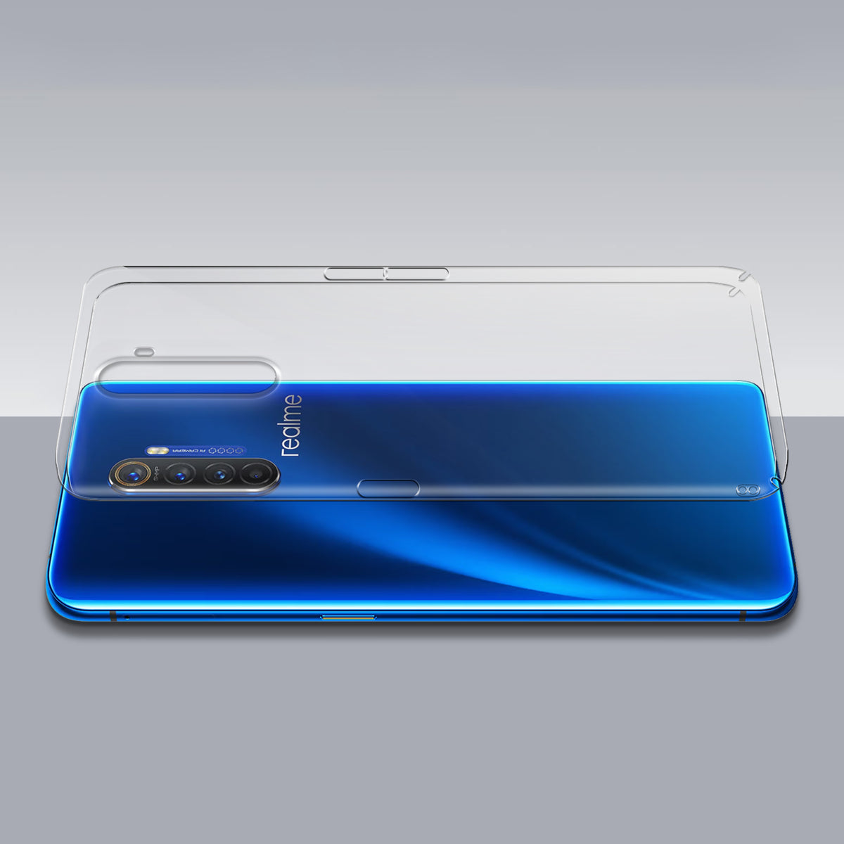 Transparent hard back case being installed on Realme X2 Pro showing perfect alignment and camera protection fit