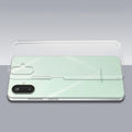 Transparent hard back case being installed on Samsung M06 5G showing perfect alignment and camera protection fit