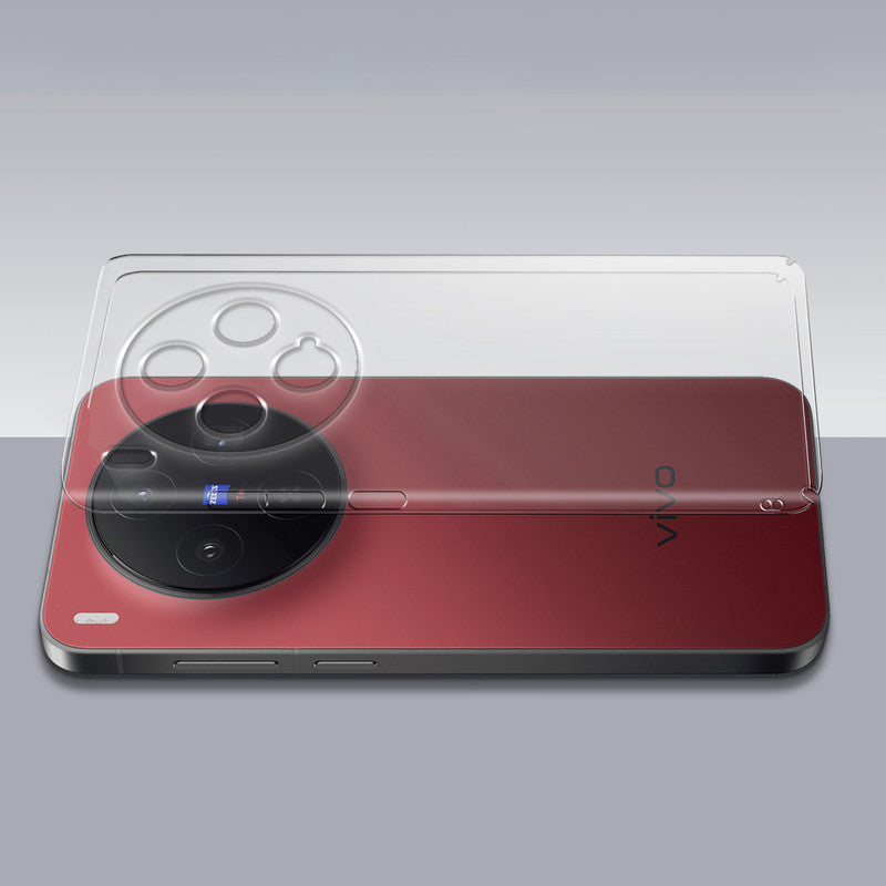 Transparent hard back case being installed on Vivo X300 5G showing perfect alignment and camera protection fit