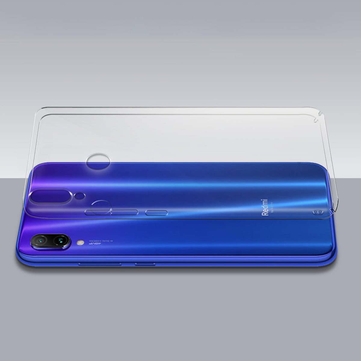 Transparent hard back case being installed on Redmi Note 7 Pro showing perfect alignment and camera protection fit