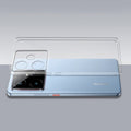 Transparent hard back case being installed on Realme GT 7 5G showing perfect alignment and camera protection fit