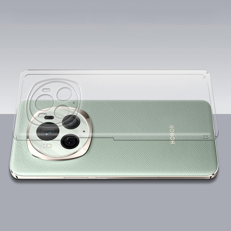 Transparent hard back case being installed on Honor Magic 6 Pro showing perfect alignment and camera protection fit