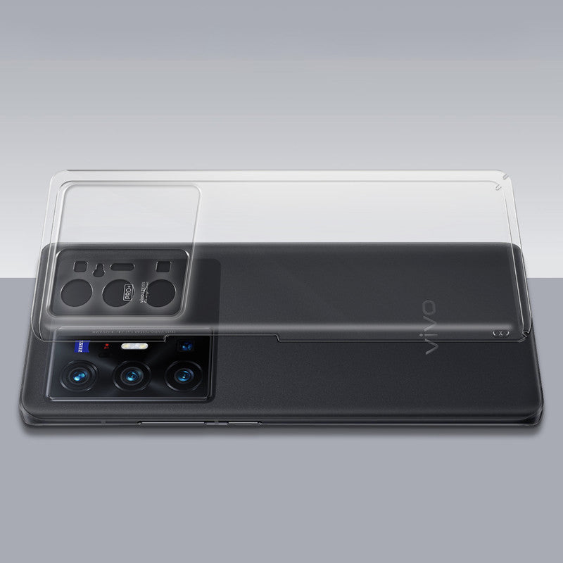 Transparent hard back case being installed on Vivo X70 Pro Plus 5G showing perfect alignment and camera protection fit