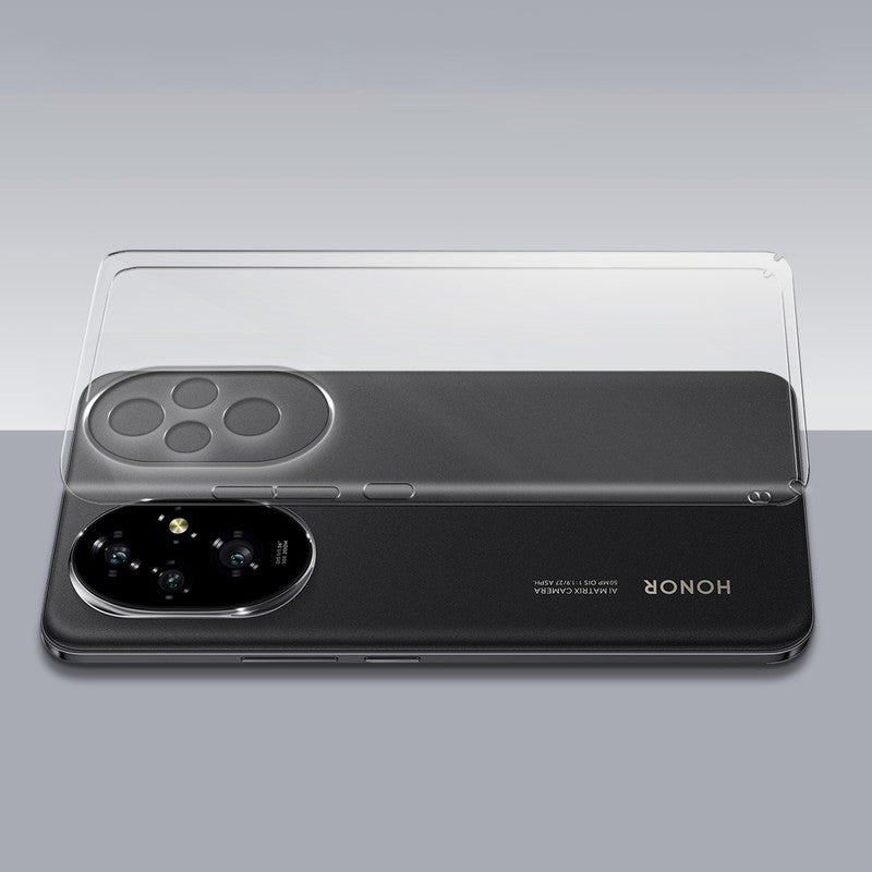 Transparent hard back case being installed on Honor 200 5G showing perfect alignment and camera protection fit