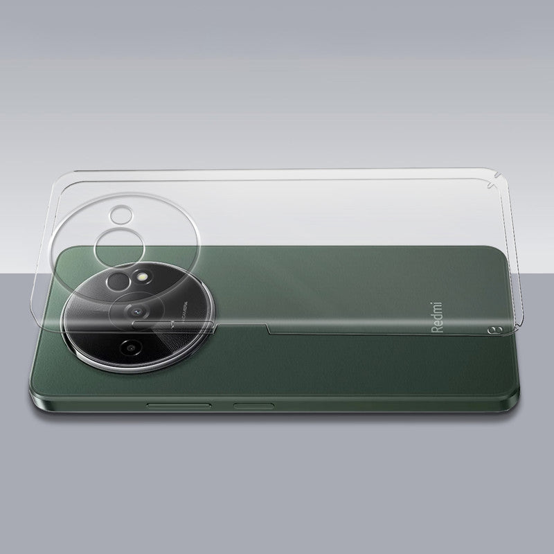Transparent hard back case being installed on Redmi A3x showing perfect alignment and camera protection fit