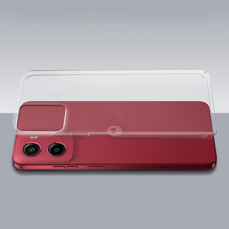 Transparent hard back case being installed on Motorola Moto G05 showing perfect alignment and camera protection fit