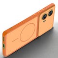 Slim silicone Orange phone case for Motorola Moto Edge 50 Fusion 5G side angle view showing grip texture and precise cutouts