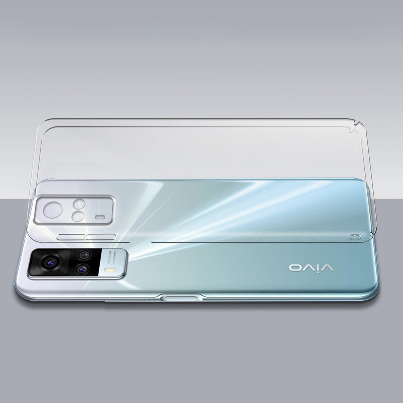 Transparent hard back case being installed on Vivo Y31 2020 showing perfect alignment and camera protection fit