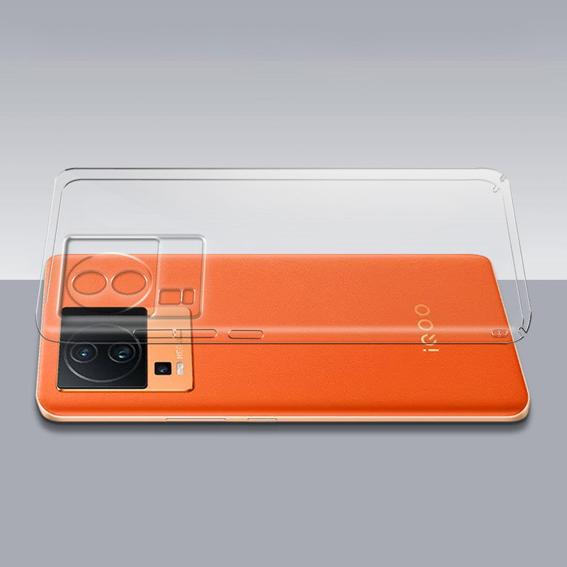 Transparent hard back case being installed on iQOO Neo 7 Pro 5G showing perfect alignment and camera protection fit